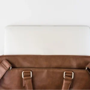 Brown briefcase with tablet